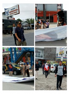 Panwaslu Pelalawan Bersama Kepolisian dan Satpol PP Tertibkan APK Paslon