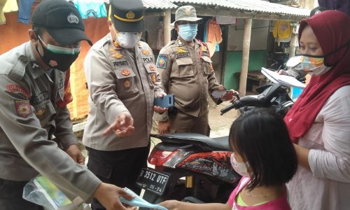 1.500 Masker Dibagikan Polres Kep Seribu Himbau Warga Cegah Covid-19