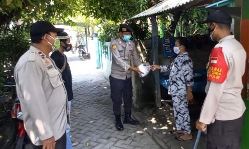 Cegah Sebaran Covid-19, 1.500 Masker Dibagikan kepada Warga oleh Polres Kep Seribu