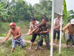 Desa Muara Bakti Terendam Akibat Hujan Tiada Henti, Kades Turun Langsung Kerja Bakti