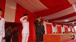 Upacara Penurunan Bendera HUT ke-81 RI di Pasar Kemis Berlangsung Khidmat dan Kondusif
